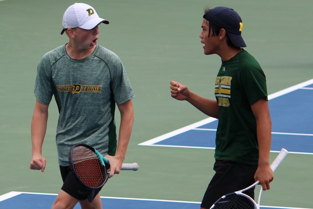 No. 1 doubles pair Thomas Ladwein, left, and Boaz Qui are pumped up during a Dow match this season. 