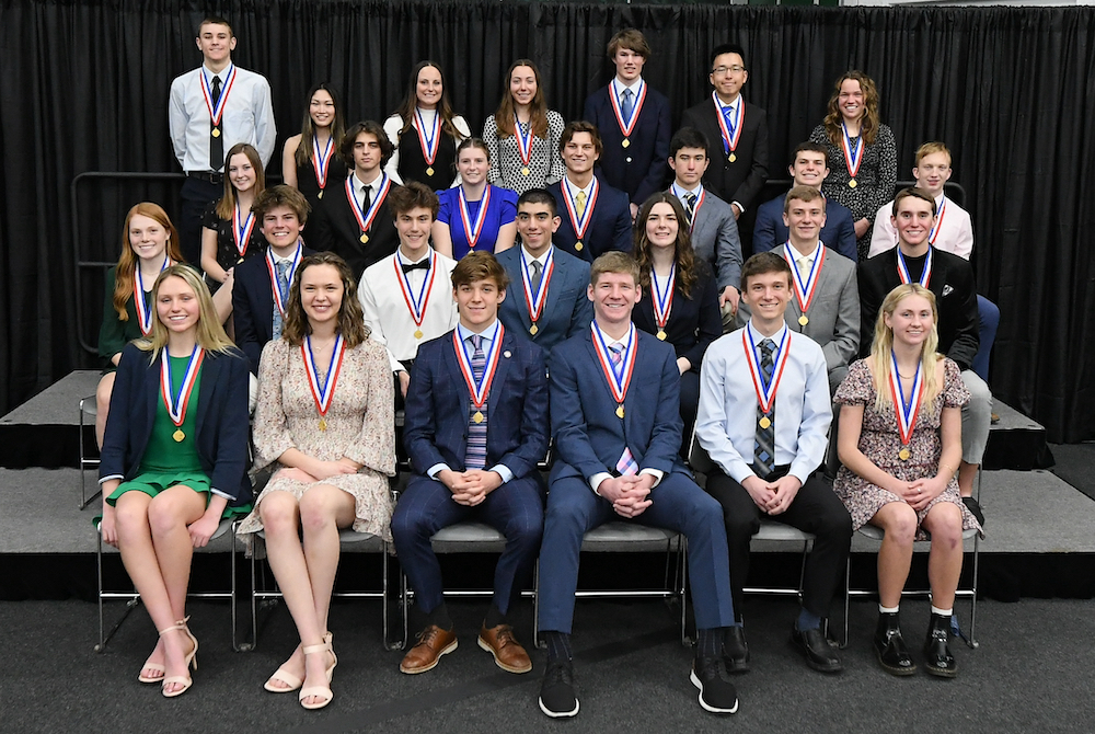 A group including 27 of last season's 32 MHSAA-Farm Bureau Insurance Scholar-Athlete Award winners take a photo together during the banquet at Breslin Center. 
