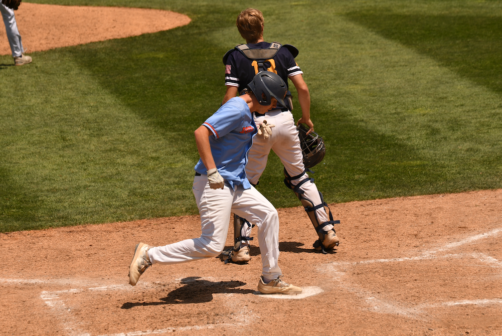 Bridgman scores one of its seven runs during Saturday’s Division 3 championship game.