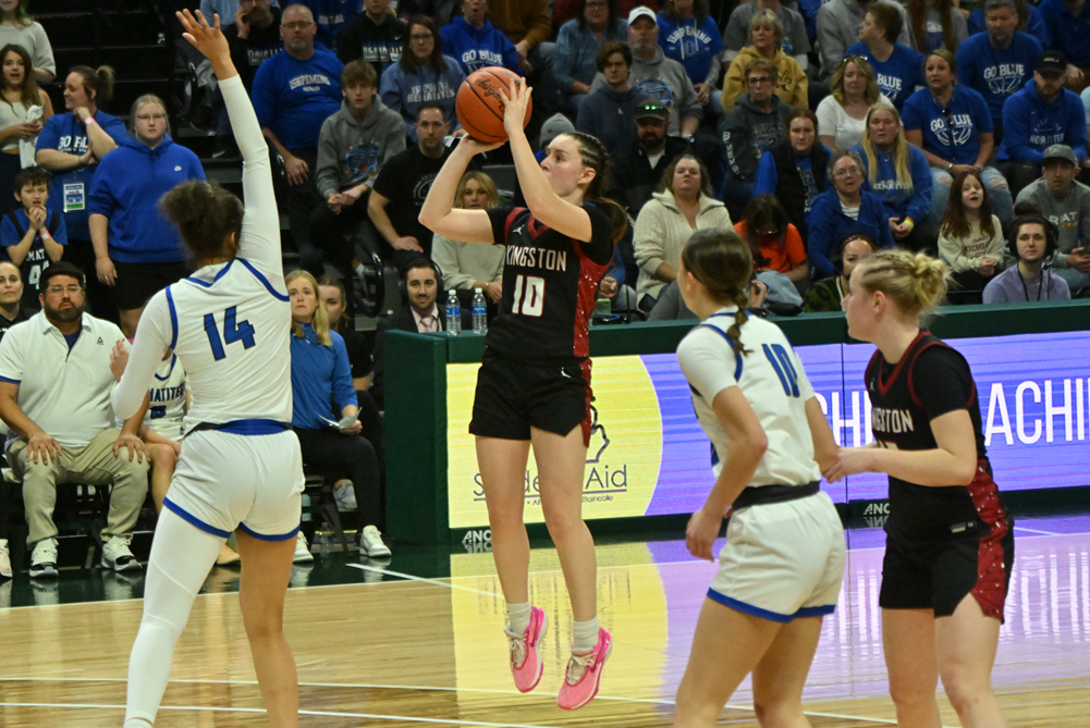 Kingston’s Delaney St. George (10) pulls up for a shot during the Division 4 Final against Ishpeming.
