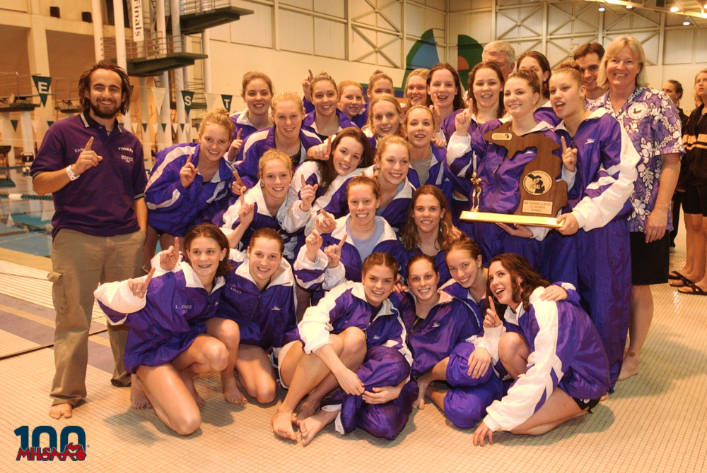 Ann Arbor Pioneer's girls swimming & diving team is celebrating its 2002 Lower Peninsula Division 1 title..