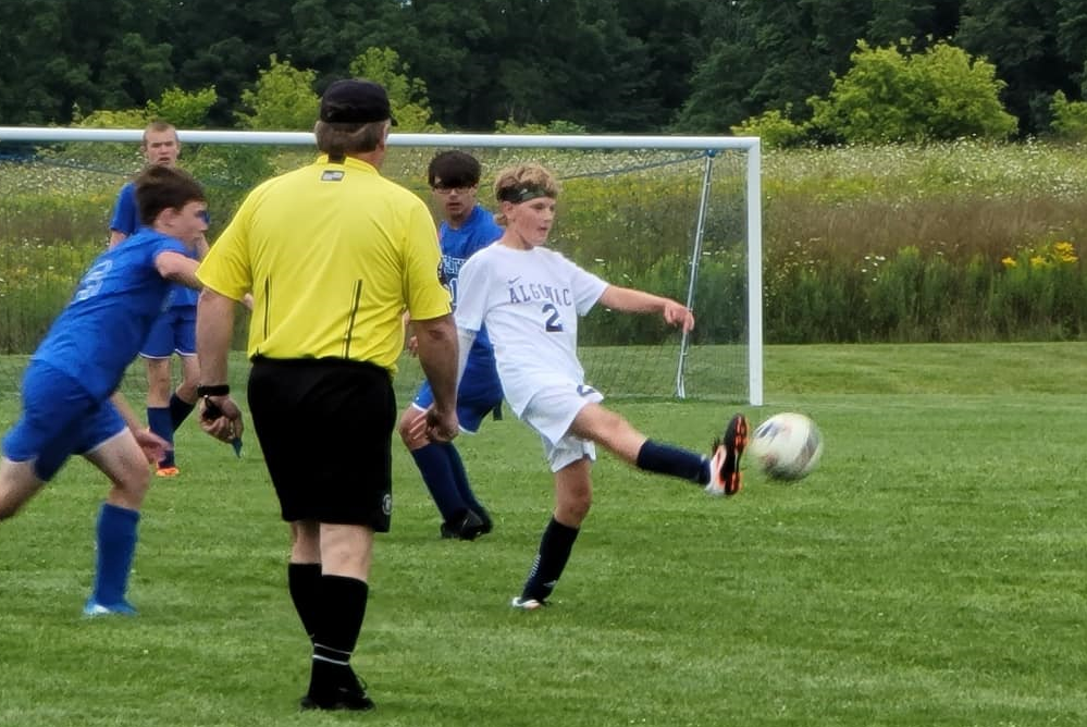 Algonac’s Louis LaParl (2) clears the ball during a game against Croswell-Lexington.