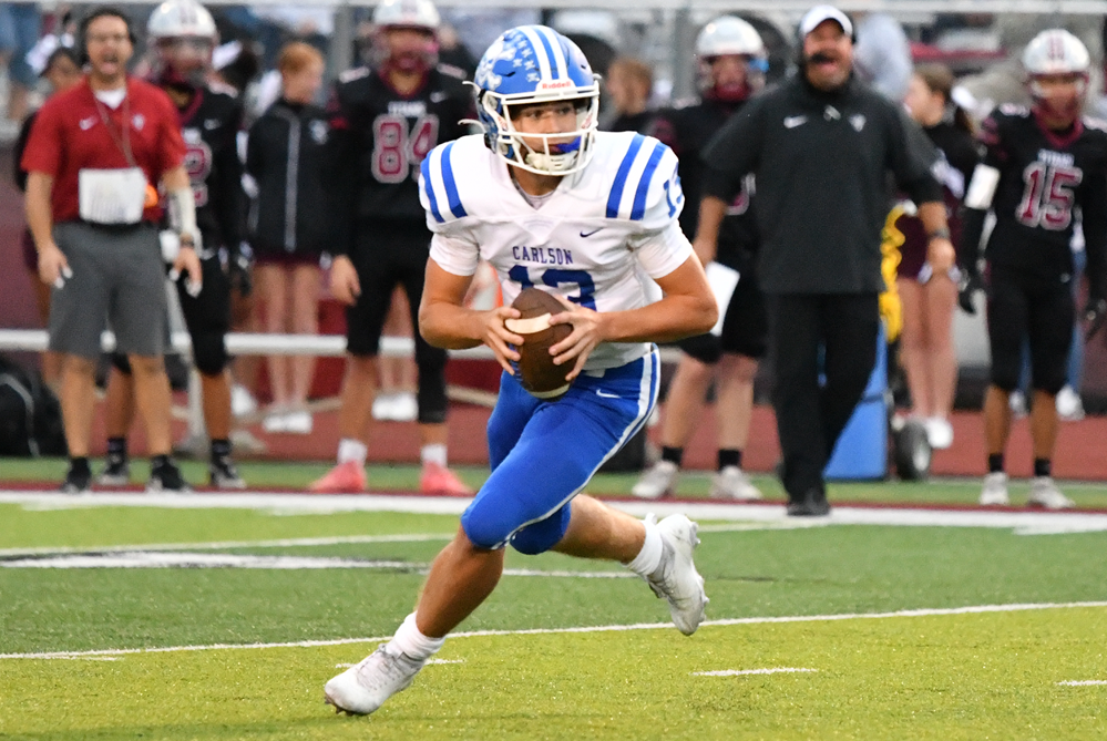 Gibraltar Carlson quarterback Joe Krolak considers his best option during last week’s win over Southgate Anderson. 