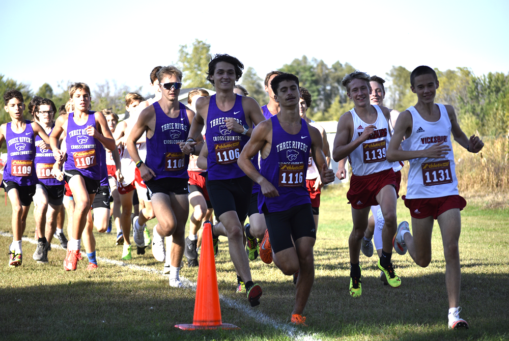 Three Rivers and Vicksburg runners take off at the start of the boys race last week at Indian Lake Nazarene Camp.