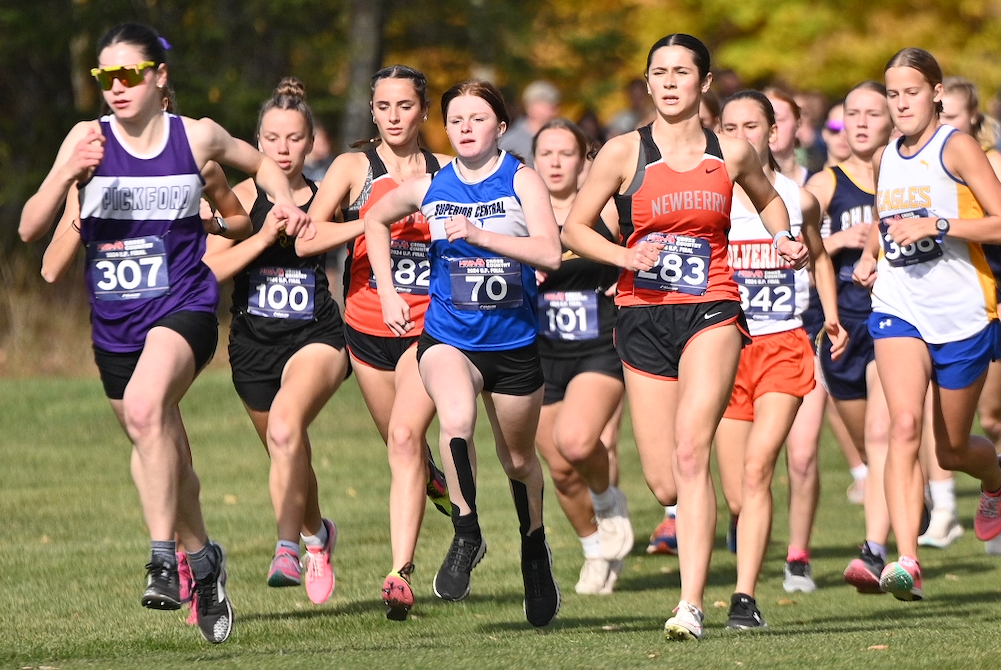 Runners – including eventual champion Talya Schreiber of Pickford (307) – begin the Division 3 race at the Upper Peninsula Finals on Saturday.