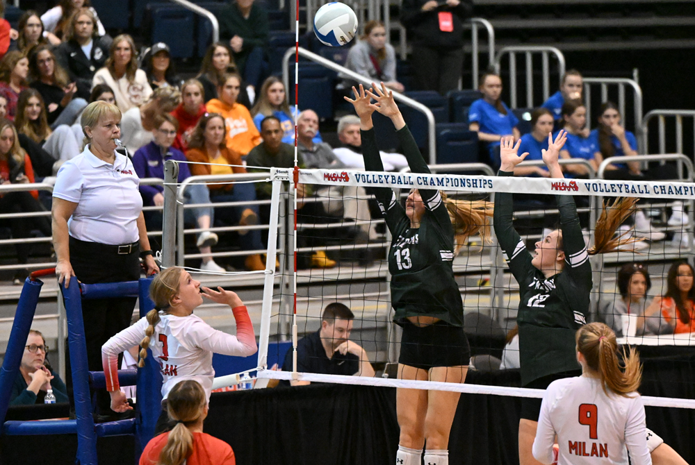 A referee monitors the action from the chair during last season's Division 2 Volleyball Semifinals at Kellogg Arena.