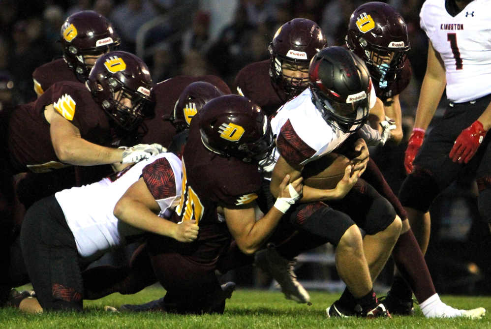 The Deckerville defense converges on a Kingston ball carrier during this season’s 44-0 victory.