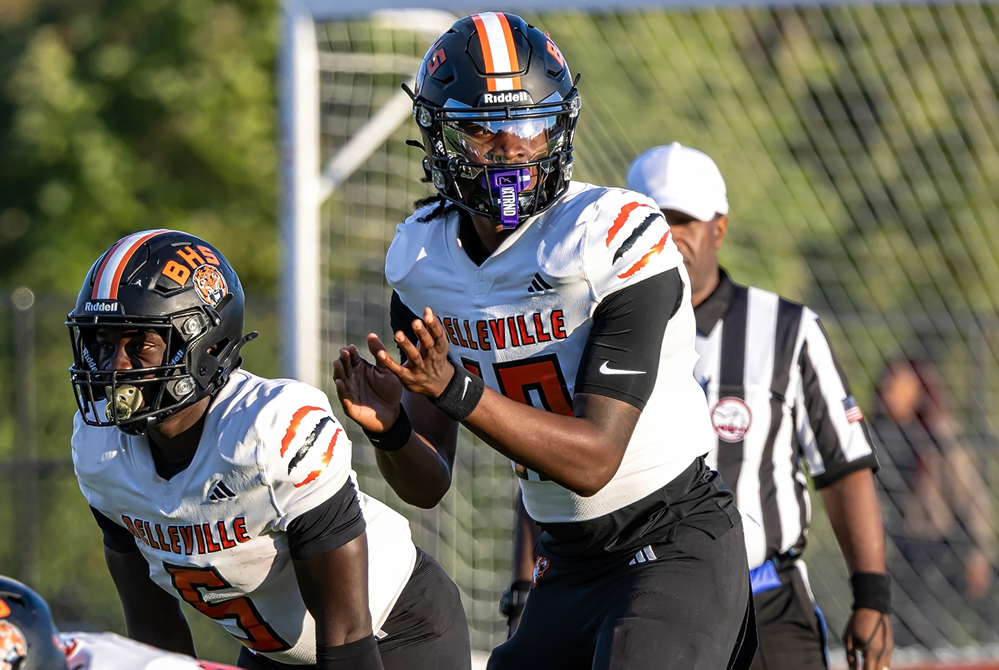 Belleville's Bryce Underwood (19) prepares to take a snap during his team's regular-season win over Livonia Stevenson.