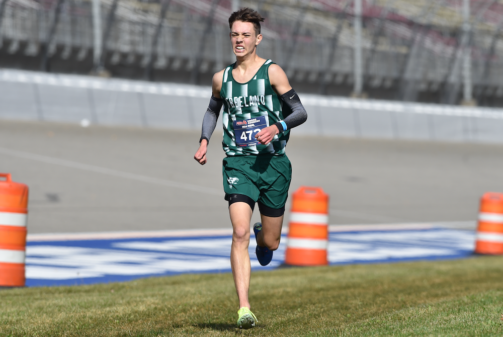 Freeland’s TJ Hansen pushes to the finish line in the Division 2 race Saturday after looking back to see Marshall’s Jack Bidwell also on the home stretch. 