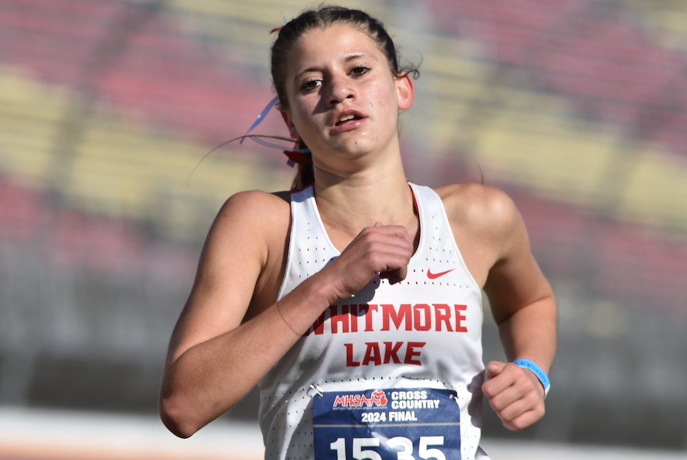 Whitmore Lake’s Kaylie Livingston approaches the finish during her Division 4 championship race Saturday at Michigan International Speedway.