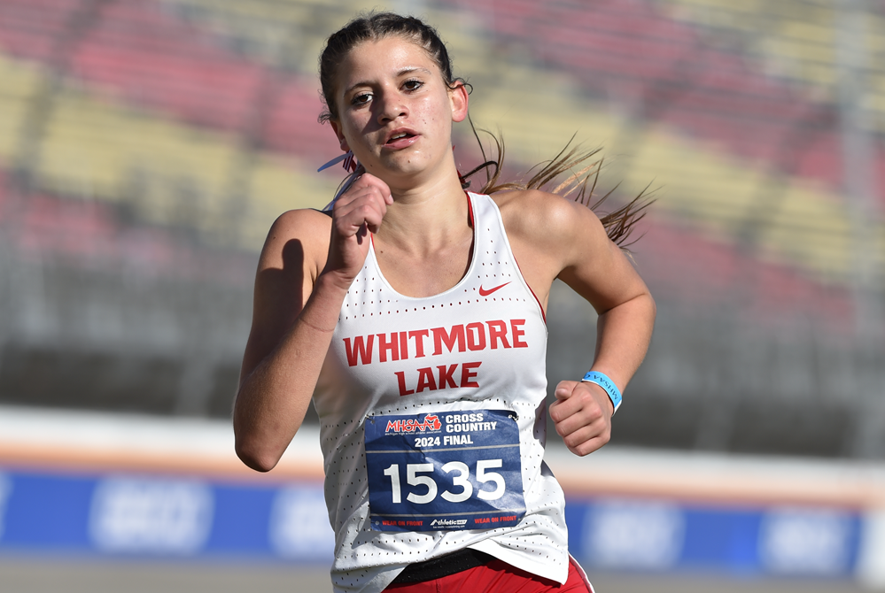 Whitmore Lake’s Kaylie Livingston approaches the finish during her Division 4 championship race Saturday at Michigan International Speedway.