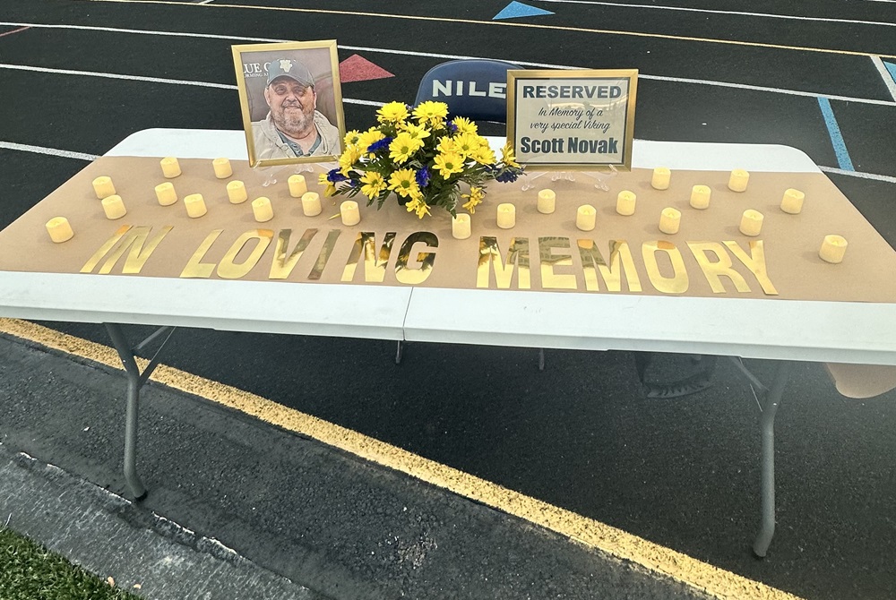 Niles High School set up a memorial table in honor of Scott Novak at Friday's home Division 4 playoff game against Paw Paw. 