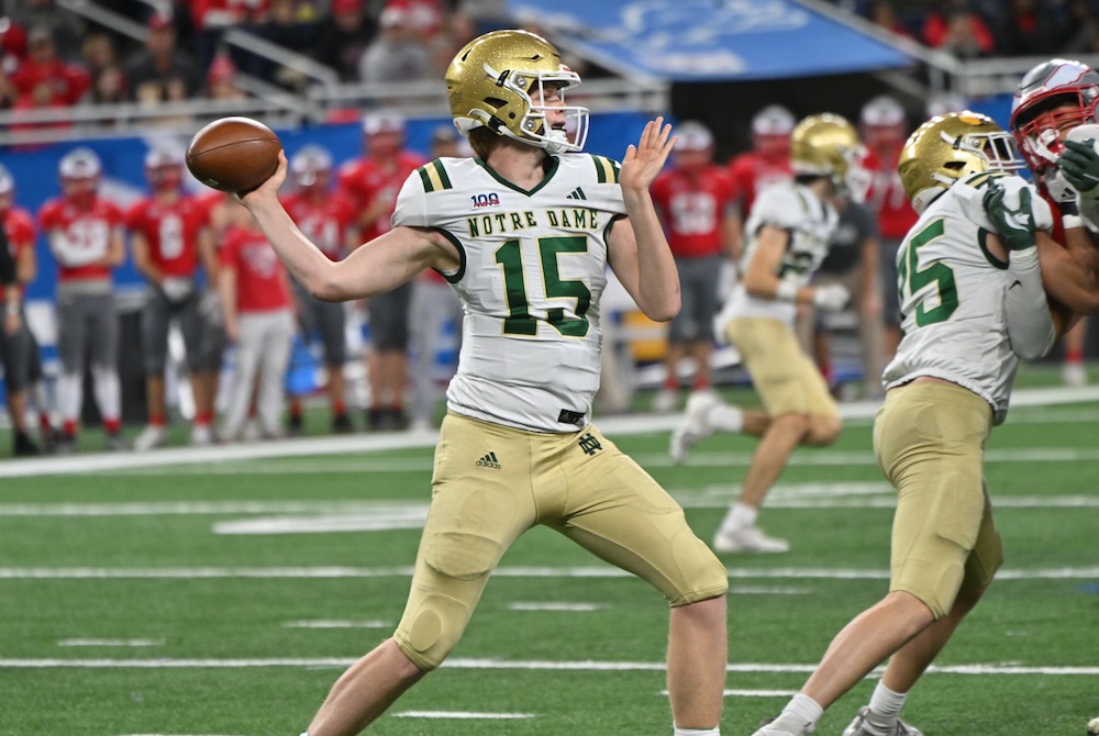 Notre Dame Prep quarterback Sam Stowe (15) winds up to throw a pass Saturday as his line holds off the rush.