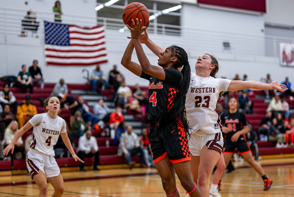 Belleville's Paisley Stephens (4) gets to the basket during a win over Parma Western on Dec. 21 at Detroit Renaissance.