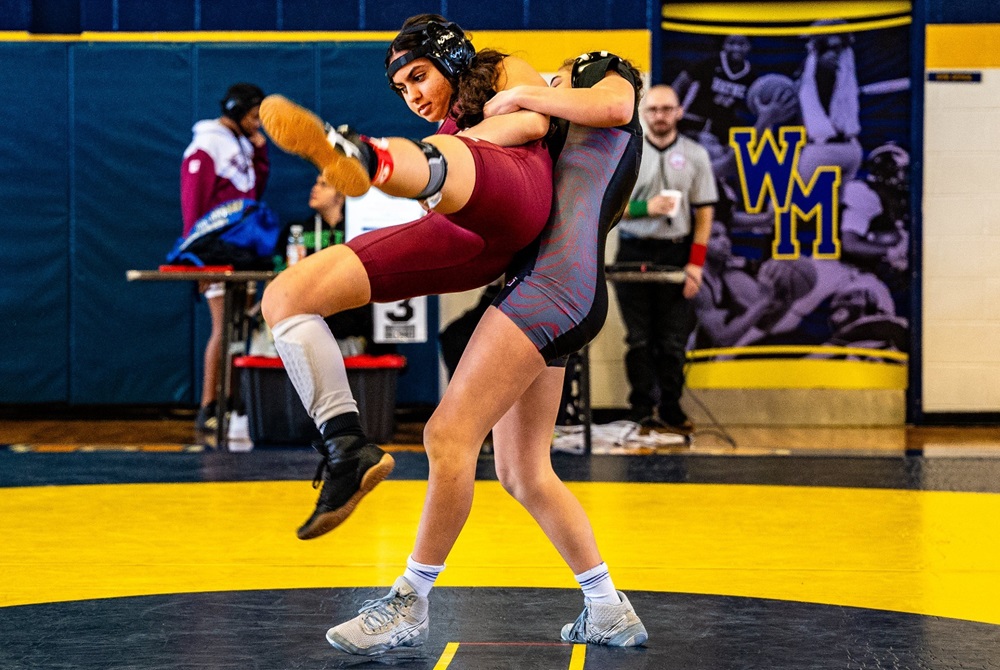 A pair of wrestlers compete during Saturday’s Wayne County Women’s Wrestling Championships at Wayne Memorial.