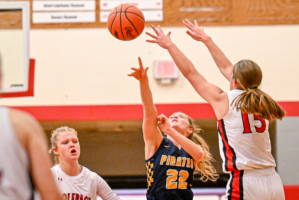 Pewamo-Westphalia’s Elly Bengel launches a halfcourt shot that gave the Pirates an eight-point lead during their 58-34 win over Laingsburg on Jan. 16.