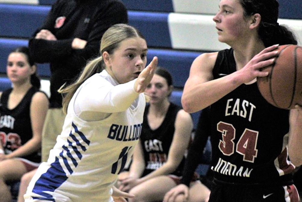 Inland Lakes junior Mary Myshock (11) defends during a game against East Jordan this season.