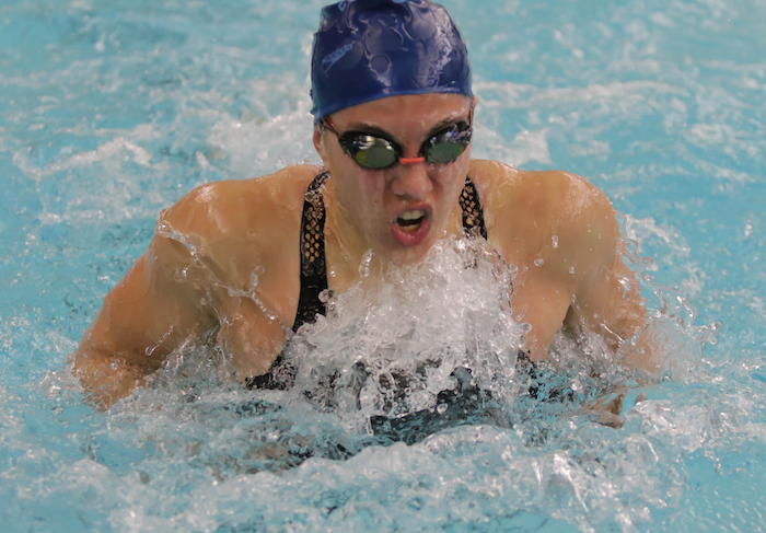 Livonia Stevenson’s McKenzie Siroky swims to a repeat in the breaststroke.
