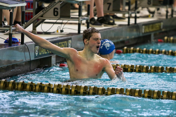 Adrian’s London Rising celebrates his victory in the 200 freestyle. 