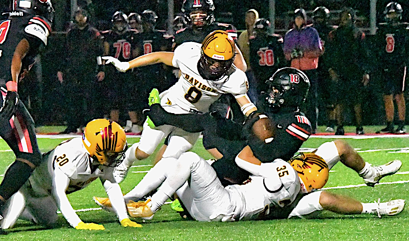 Davison defenders swarm during their win over Grand Blanc. 