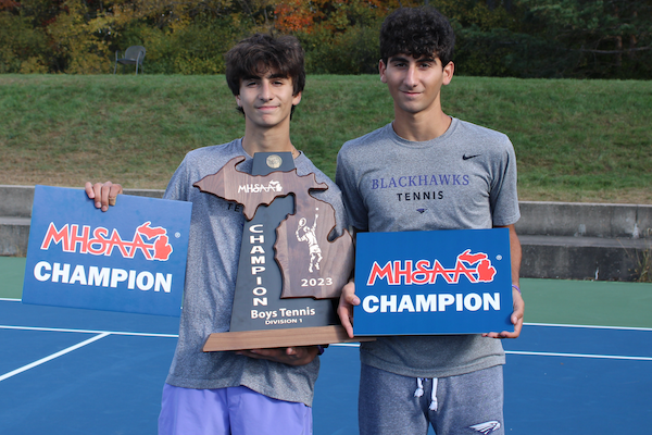 Brothers Connor and Pierce Shaya celebrate their singles championships. 