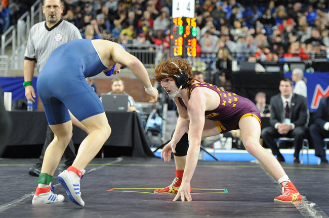 Teammate Blake Sloan, right, considers his next move during his championship match last season.