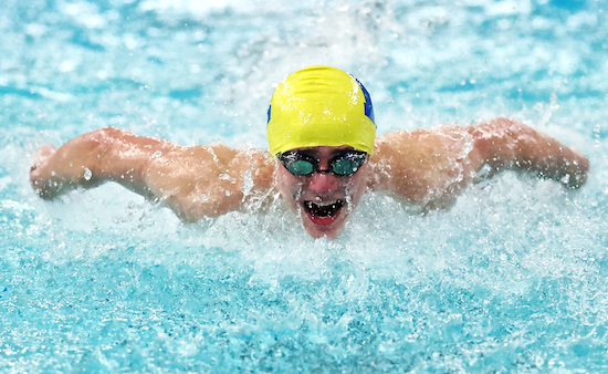 Kingsford’s Joey Lundholm swims to a win in the 200 individual medley.