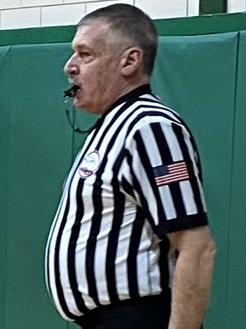 Lowe refs the junior varsity game before the recognition ceremony. 