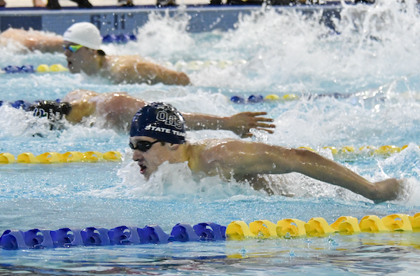 Otsego's Liam Smith, bottom, pulls away for the win in the butterfly. 