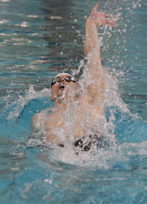 Oxford’s Olin Charnstrom swims to a repeat championship in the backstroke.