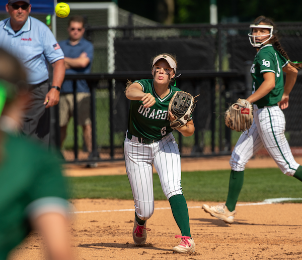 Lake Orion’s Anna Gardner makes a throw to first base during her team’s victory.