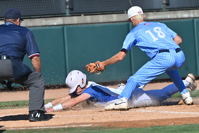 Beal City’s Cayden Smith scores under the tag of Maple Valley’s Jakeb McDonald (18)