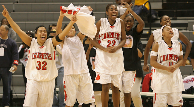 Hughes, second from left, begins the championship celebration with her Lathrup teammates at Breslin Center.