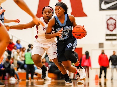 Walker makes her move toward the basket during a game her senior season at Muskegon Mona Shores. 