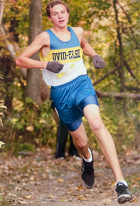 Darling rounds a turn during a high school race.