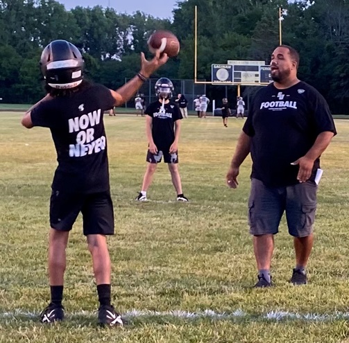 Phoenix players play catch during their first practice. 