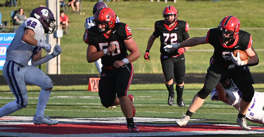 Marquette's Drew Bradley (6) breaks a tackle and gains several yards.