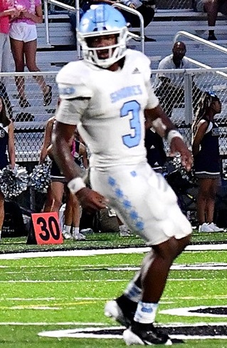 Pittman watches as a teammate carries the ball upfield.