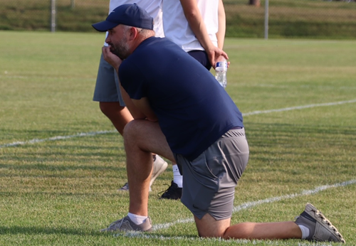 Fruitport boys soccer coach Dan Hazekamp keeps a close eye on the action.