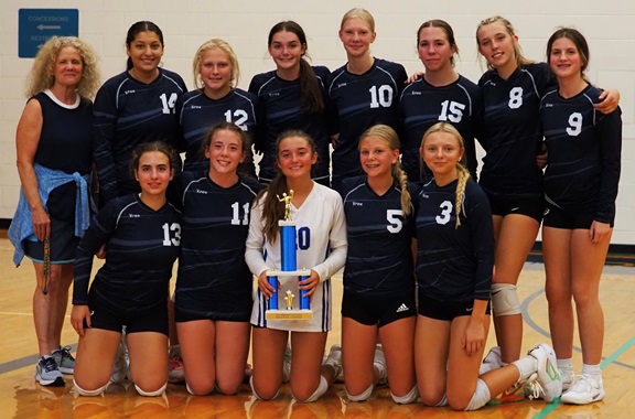 The Portagers pose for a team photo following their home invitational championship. 