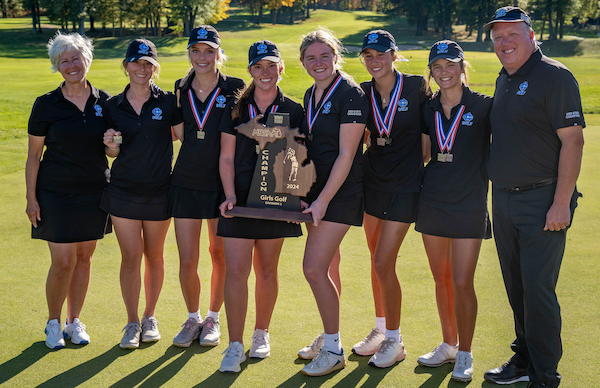 The Cougars take a team photo as champions for the second-straight season.