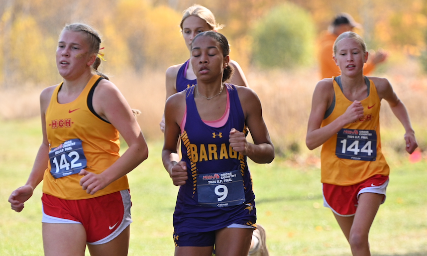 Hancock's Ella Keranen (142), Baraga's Princess Pierre (9) and Hancock's Alena Pietila (144) follow race leader Aubrey Smith of Ironwood.