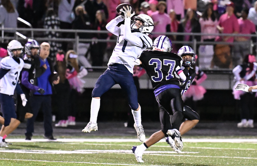 An Otsego player pulls in a pass during the Bulldogs' 17-7 win over Three Rivers. 