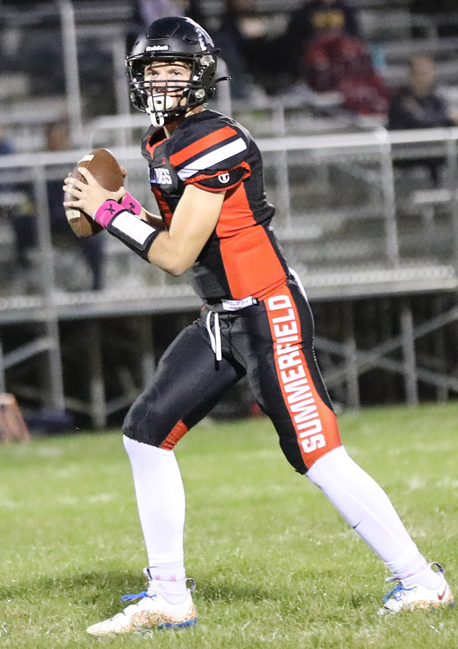 Bulldogs quarterback Trace Secor considers his options from the pocket.