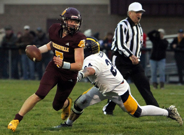 Hunter Garza eludes an Alcona defender last week. 