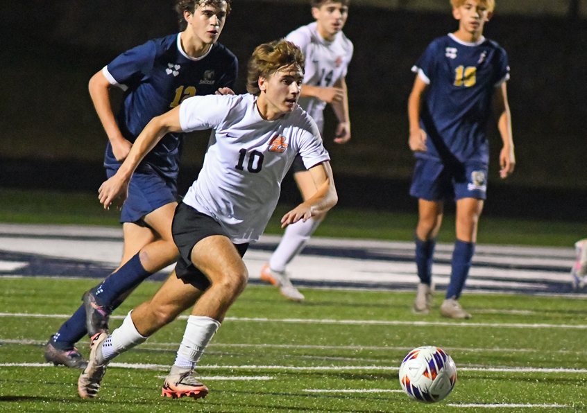 Byron Center’s Kaleb Smith (10) pushes the attack during Wednesday’s Semifinal win over Oxford. 