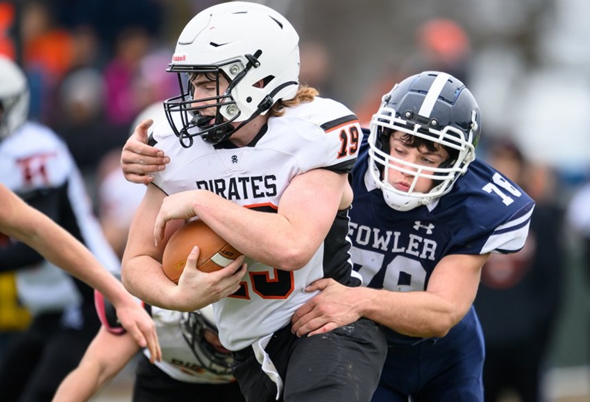 Fowler’s Joe Epkey (78) wraps up a Harbor Beach ball carrier Saturday. 