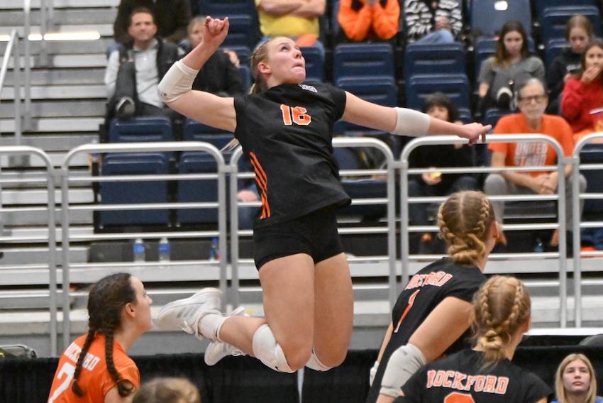 The Rams' Mallory Wandel (16) elevates for a kill attempt against the Tigers (36-5). Wandel finished with 18 kills.