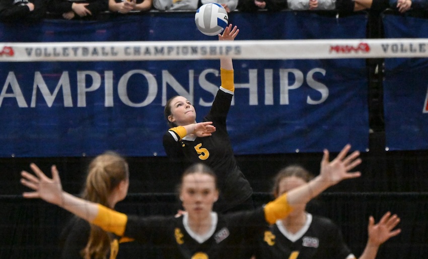 Clarkston Everest Collegiate’s Emmerson Phyle (5) serves during her team’s 25-10, 25-16, 25-13 sweep of Hancock to open the Division 4 Semifinals on Thursday. Phyle had a pair of aces during the match.