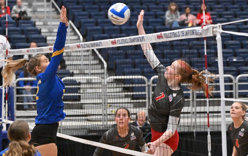 Mount Pleasant Sacred Heart’s Erin Judge (7) sends a kill attempt toward the Our Lady of the Lake side of the court. Judge finished with 13 kills, but the Lakers prevailed 24-26, 25-22, 26-11, 26-28, 15-8.